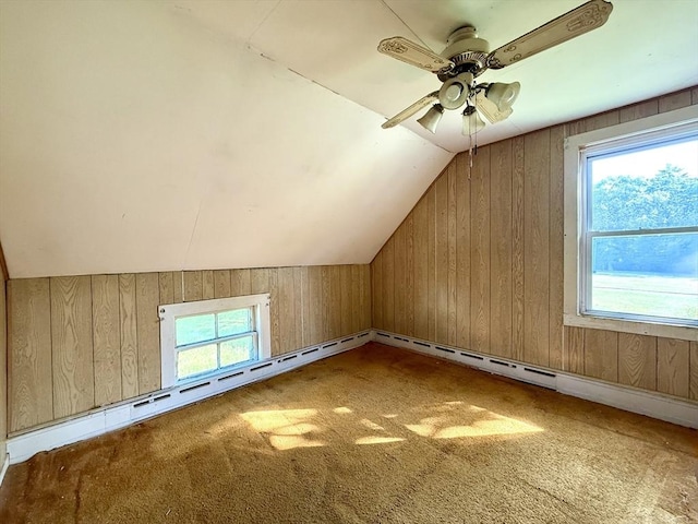 527 Collins Corner Rd, Dartmouth, MA 02747 - additional living space featuring vaulted ceiling, wooden walls, carpet, and a ceiling fan