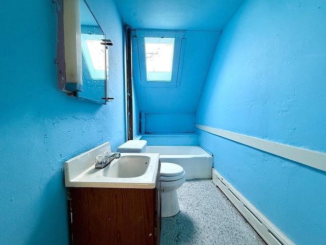 527 Collins Corner Rd, Dartmouth, MA 02747 - full bathroom with a baseboard radiator, toilet, vanity, a bathtub, and a textured wall