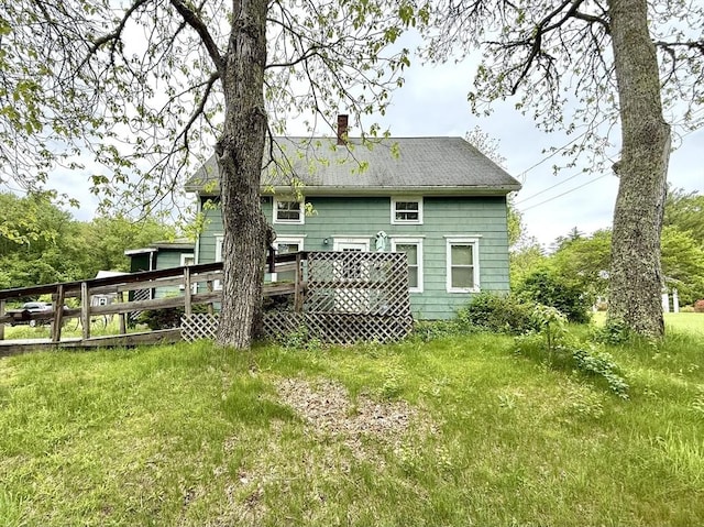 527 Collins Corner Rd, Dartmouth, MA 02747 - back of house with a chimney and a wooden deck