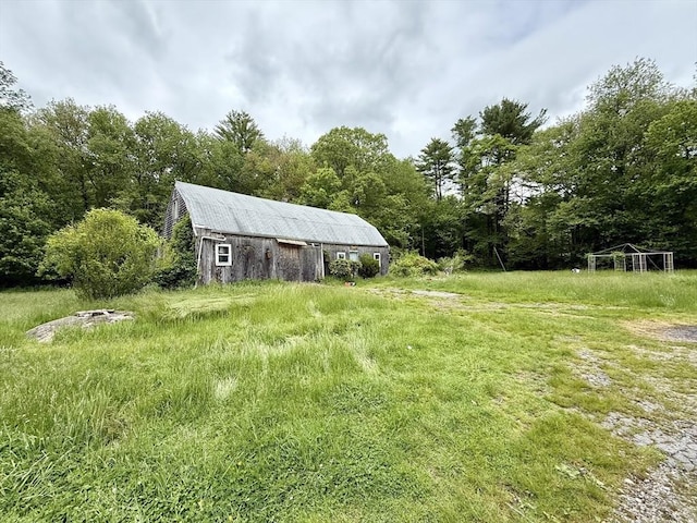527 Collins Corner Rd, Dartmouth, MA 02747 - view of yard with an outdoor structure, a barn, and a forest view