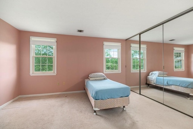 19 Garden St Unit 107, Danvers, MA 01923 - bedroom with carpet and a closet