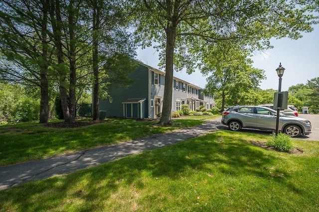19 Garden St Unit 107, Danvers, MA 01923 - view of home's community featuring a lawn
