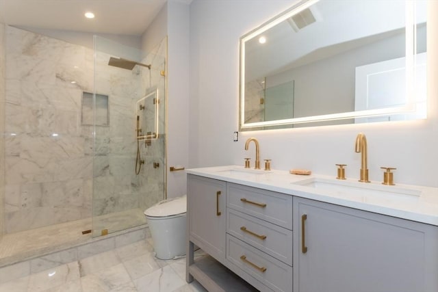 bathroom featuring a marble finish shower, toilet, double vanity, marble finish flooring, and recessed lighting