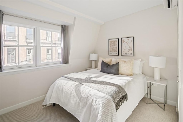 bedroom featuring light carpet