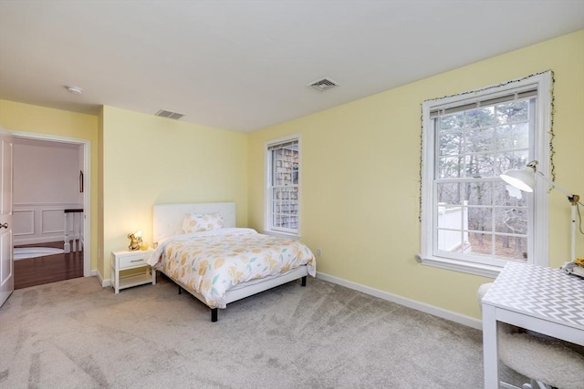 bedroom with light carpet