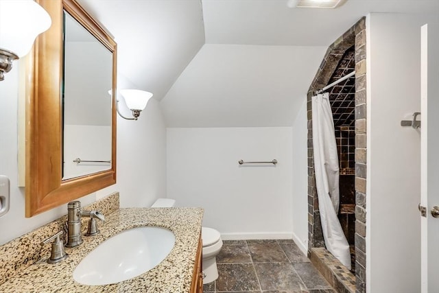 bathroom with vanity, curtained shower, toilet, and lofted ceiling