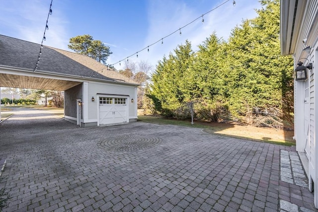 garage with a carport