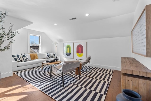 living room featuring lofted ceiling, recessed lighting, visible vents, wood finished floors, and baseboards