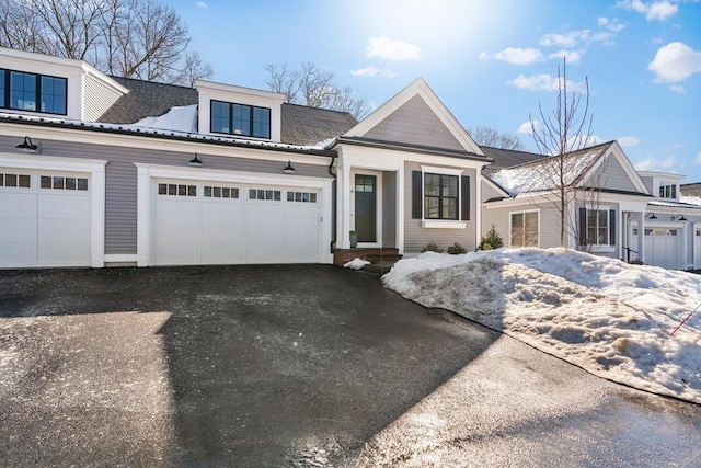 view of front of house featuring aphalt driveway