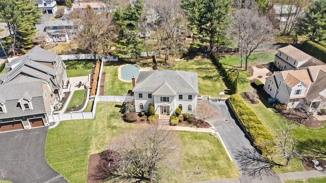 birds eye view of property with a residential view