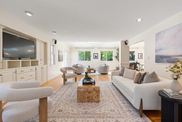 living room featuring light wood-style floors and recessed lighting
