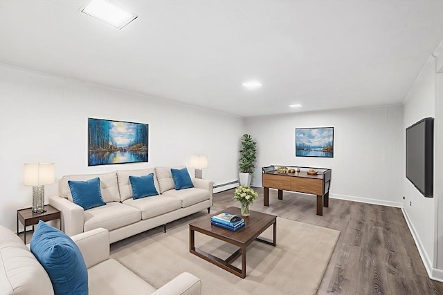 24 Gerald Rd, Marblehead, MA 01945 - living area featuring wood finished floors, a baseboard radiator, recessed lighting, and crown molding