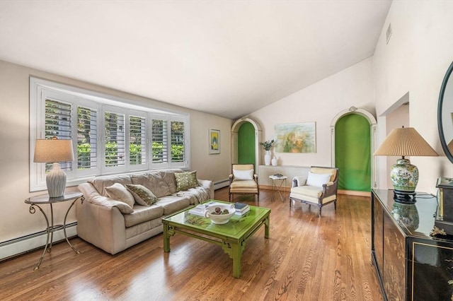 24 Gerald Rd, Marblehead, MA 01945 - living room with arched walkways, lofted ceiling, wood finished floors, and a baseboard radiator