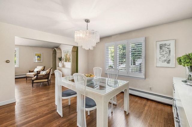 24 Gerald Rd, Marblehead, MA 01945 - dining space with a baseboard heating unit, a chandelier, and dark wood-type flooring
