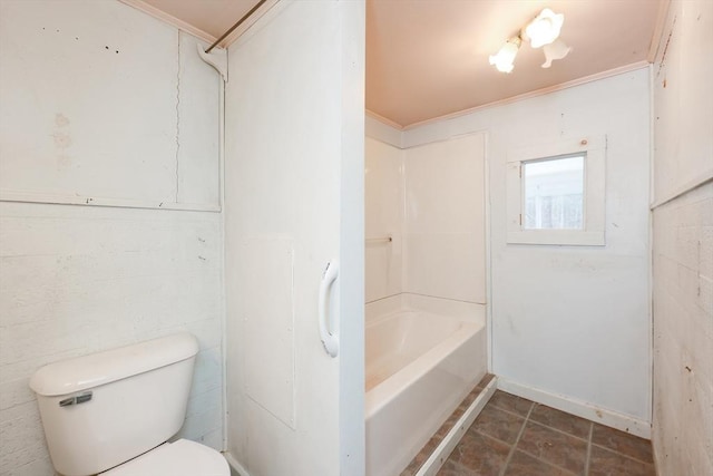 bathroom featuring toilet, shower / bath combination, and ornamental molding