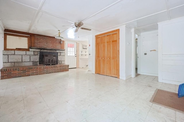 unfurnished living room featuring ceiling fan