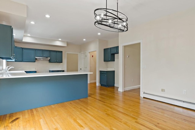 20 Miller St, Rehoboth, MA 02769 - kitchen with a peninsula, light wood-type flooring, baseboard heating, a chandelier, and recessed lighting