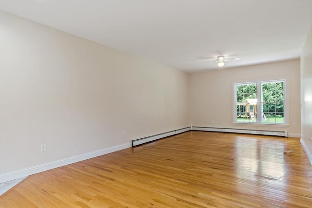 20 Miller St, Rehoboth, MA 02769 - spare room featuring light wood-style flooring, ceiling fan, baseboards, and a baseboard radiator