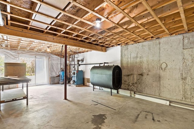 20 Miller St, Rehoboth, MA 02769 - below grade area with oil tank, a heating unit, and a water pressure tank