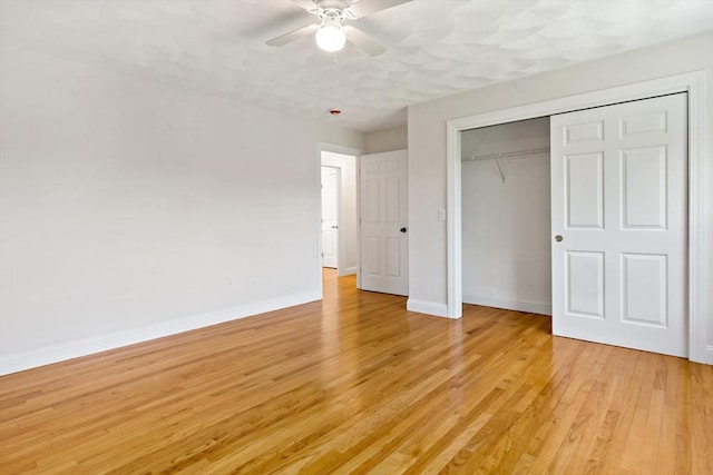 20 Miller St, Rehoboth, MA 02769 - unfurnished bedroom with light wood-style floors, baseboards, a closet, and a ceiling fan