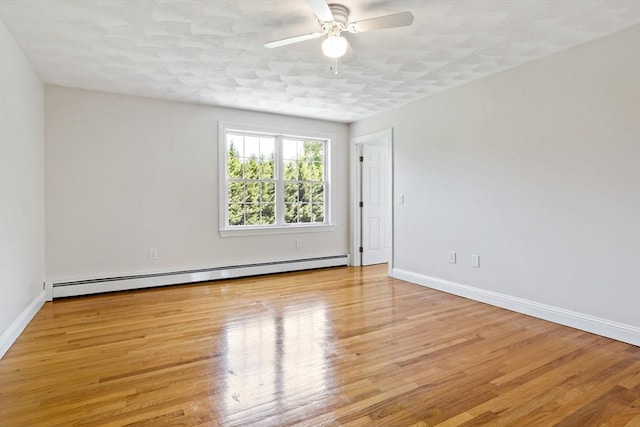 20 Miller St, Rehoboth, MA 02769 - empty room with a baseboard radiator, ceiling fan, light wood-type flooring, and baseboards