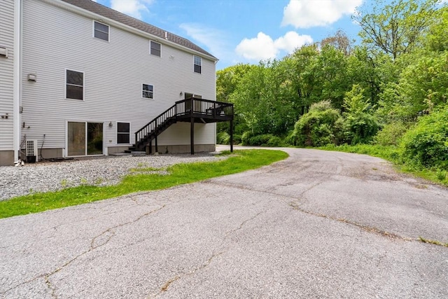 20 Miller St, Rehoboth, MA 02769 - back of property with stairs and a wooden deck