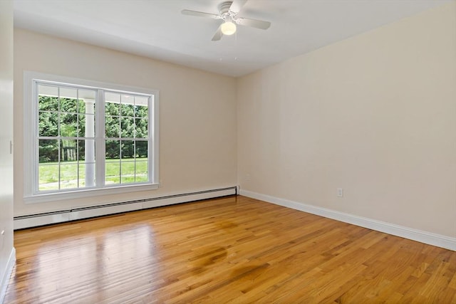 20 Miller St, Rehoboth, MA 02769 - spare room featuring baseboard heating, light wood-style floors, baseboards, and a ceiling fan