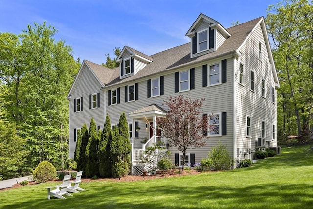 122 Green St, Northborough, MA 01532 - colonial inspired home with a front yard, central AC, and roof with shingles