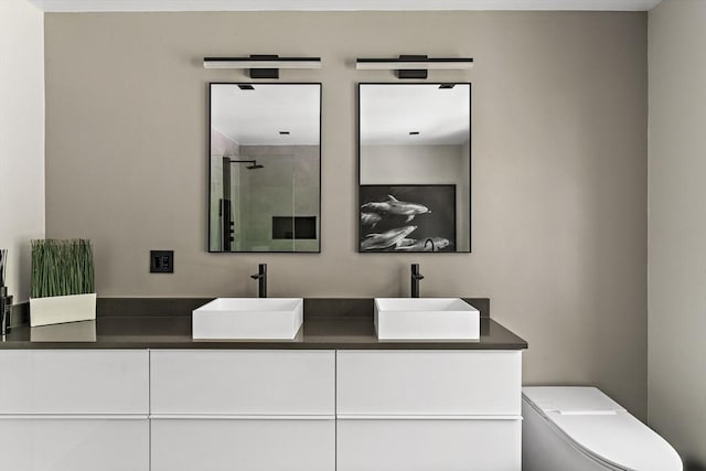 122 Green St, Northborough, MA 01532 - bathroom with double vanity, a stall shower, and toilet