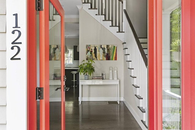 122 Green St, Northborough, MA 01532 - entryway with stairs, wood finished floors, baseboards, and ornamental molding