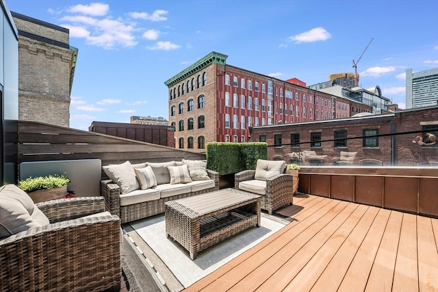 wooden deck featuring an outdoor living space