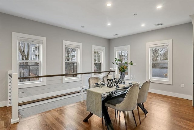 dining area featuring hardwood / wood-style floors