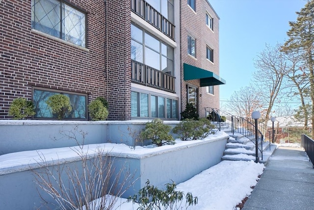 view of snow covered property