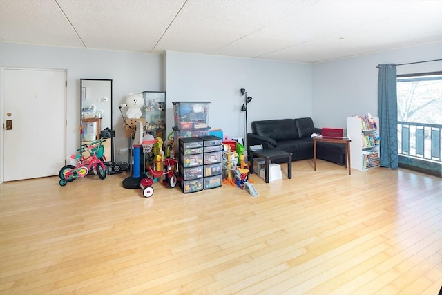 interior space featuring a textured ceiling and wood finished floors