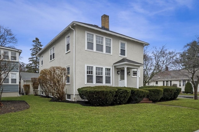 view of front of property with a front lawn