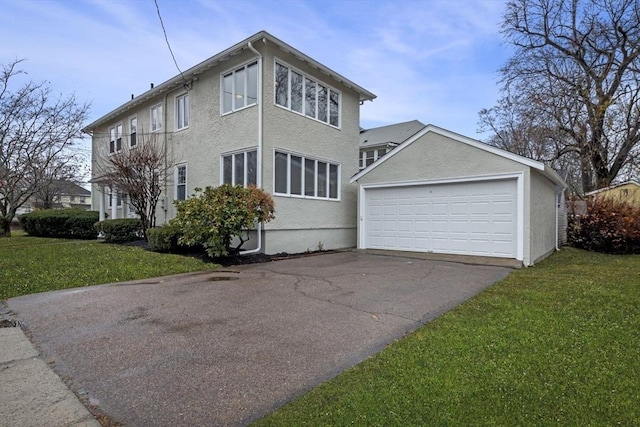 view of home's exterior featuring a yard and a garage