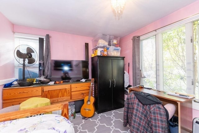 bedroom with multiple windows