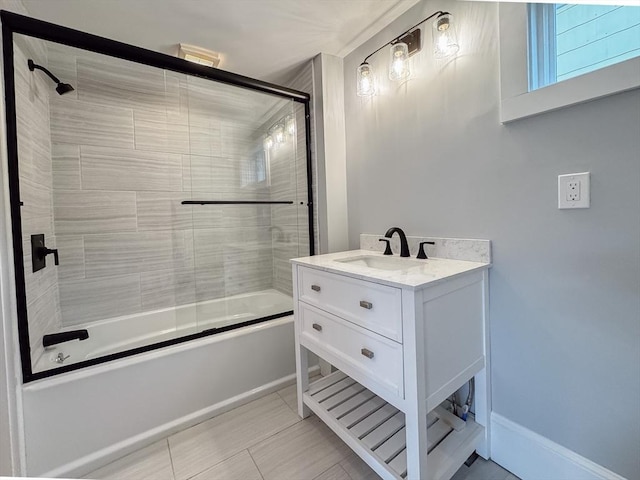 624 Western Ave, Gloucester, MA 01930 - bathroom with bath / shower combo with glass door, vanity, and tile patterned flooring