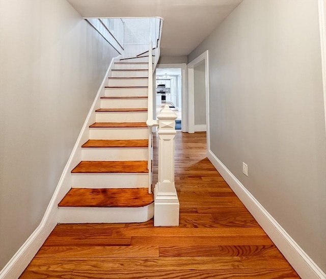 624 Western Ave, Gloucester, MA 01930 - stairway featuring wood finished floors and baseboards