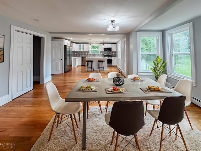 624 Western Ave, Gloucester, MA 01930 - dining area with light wood-type flooring and recessed lighting