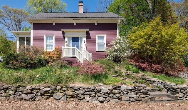 view of front of house with a chimney