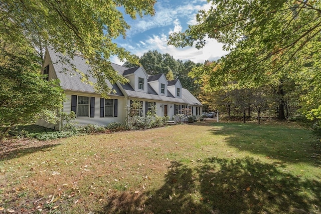 view of front of property with a front lawn