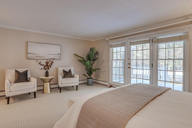 carpeted bedroom with access to exterior, ornamental molding, and a baseboard heating unit