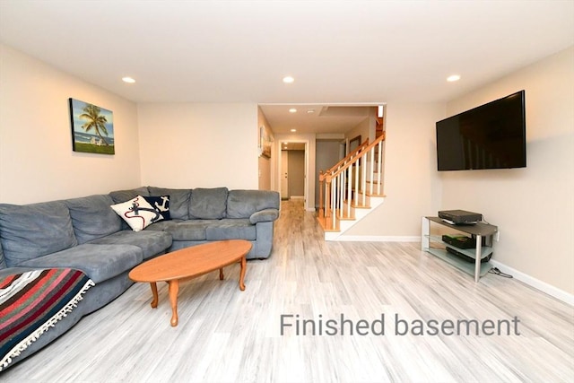 173 Standish Rd, Bourne, MA 02562 - living area with wood finished floors, recessed lighting, stairs, and baseboards