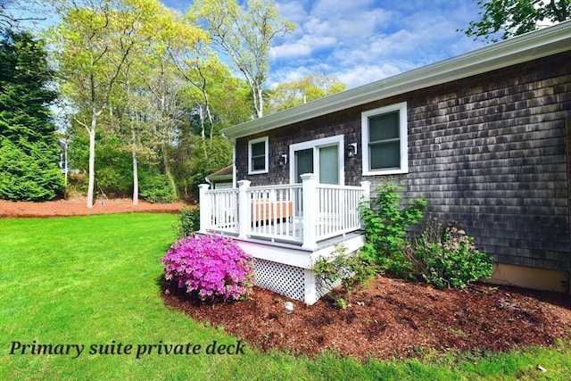 173 Standish Rd, Bourne, MA 02562 - view of side of home with a yard and a deck