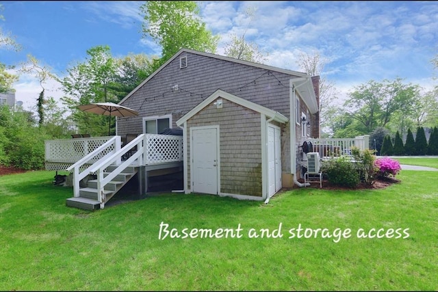 173 Standish Rd, Bourne, MA 02562 - rear view of property with a deck and a yard