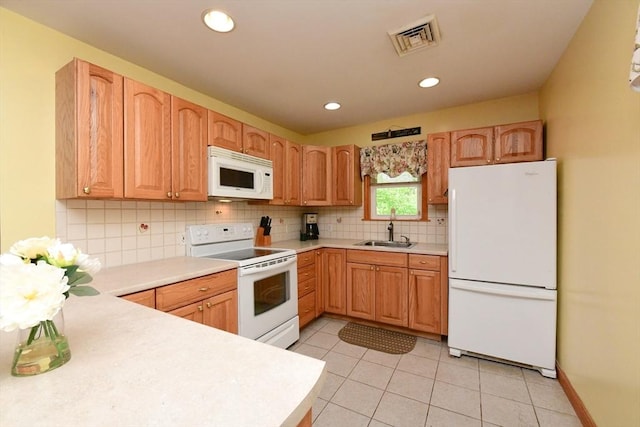 173 Standish Rd, Bourne, MA 02562 - kitchen featuring white appliances, a sink, tasteful backsplash, light countertops, and recessed lighting