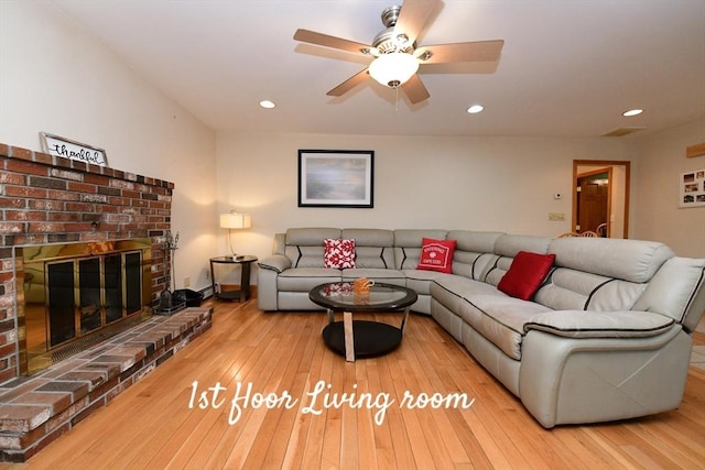173 Standish Rd, Bourne, MA 02562 - living area featuring hardwood / wood-style flooring, recessed lighting, ceiling fan, and a fireplace