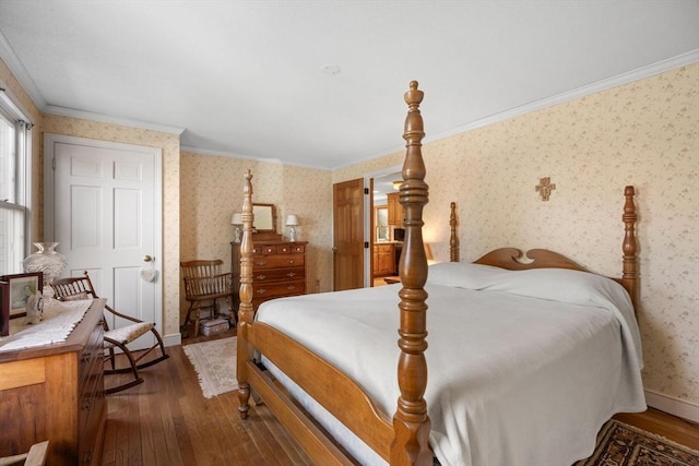 bedroom featuring crown molding and dark wood-type flooring