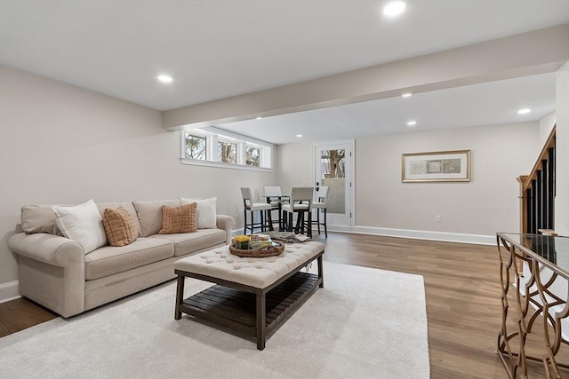 living room with light hardwood / wood-style floors